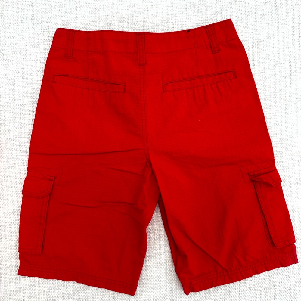 Red U.S. Polo cargo shorts for boys size 14,can fit size 10. Good condition